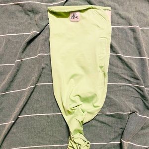 Ollie swaddle in Meadow green